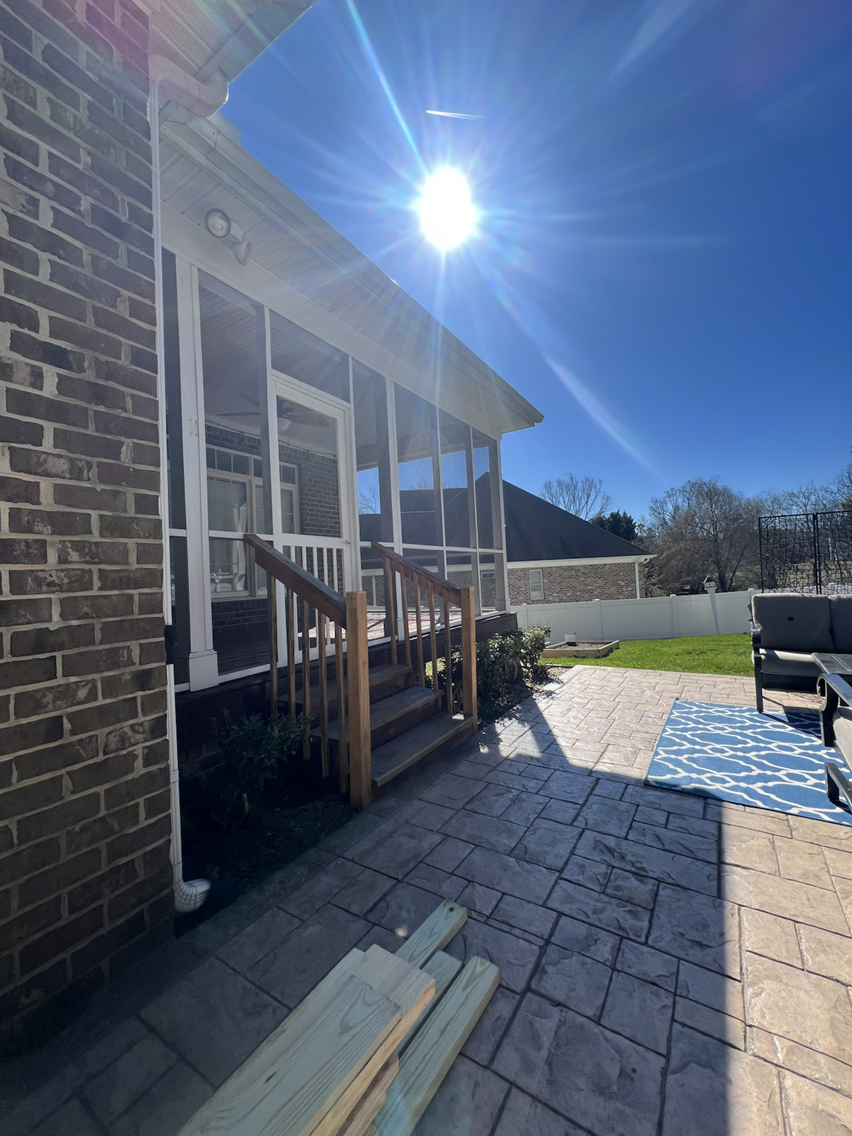 Finished screened porch and patio connection by Marco's Home Improvement & Remodeling