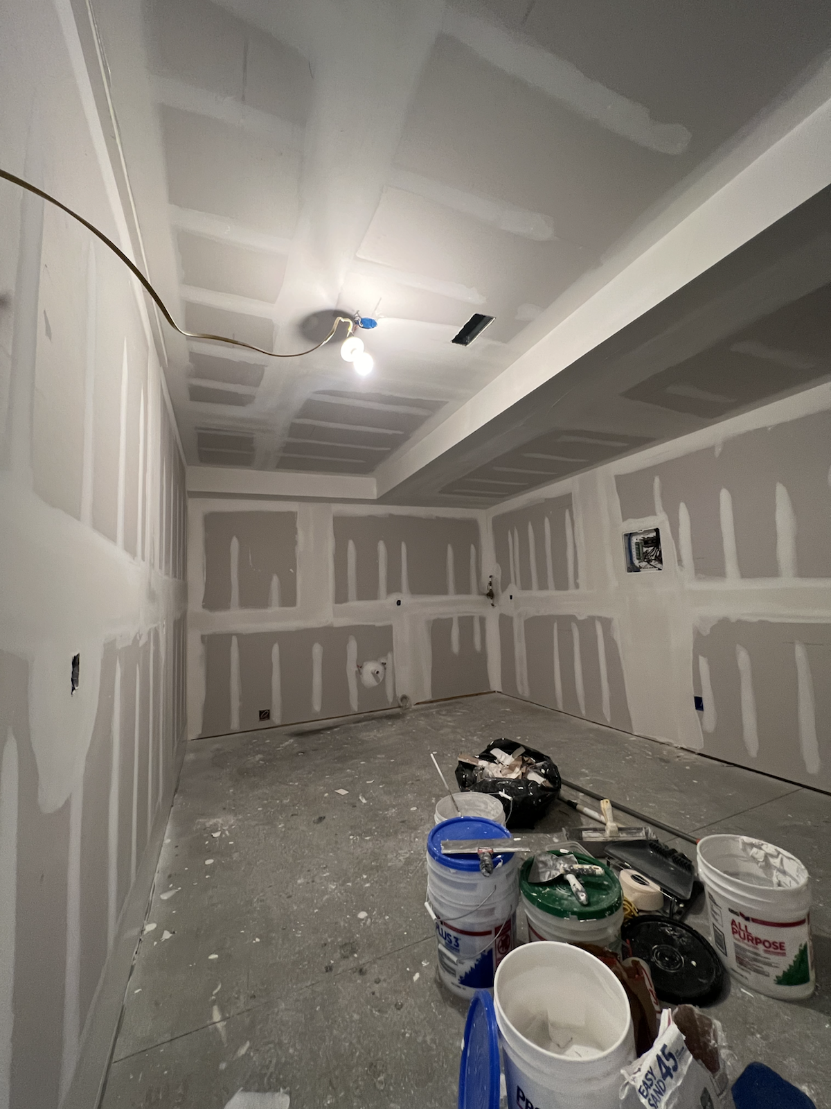 Fresh drywall and prep stage before final finish work by Marco's Home Improvement & Remodeling